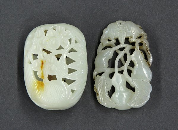 Two Chinese Jade Plaque/Toggle: (lot of 2) Chinese jade plaque and pierced toggle, the plaque reticulated with a bat above a vine with three gourds; together with a pebble, carved and reticulated with prunus and birds, the pale matr