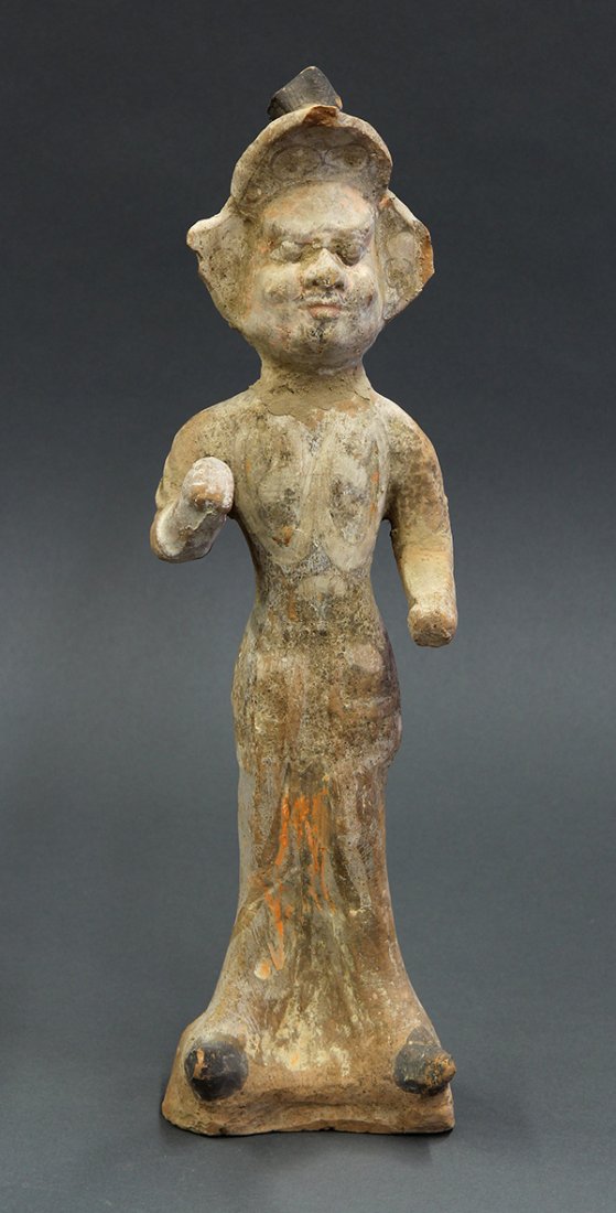 Chinese Pottery Guardian Figure: Chinese painted pottery figure of a guardian, in military garb and with the right arm bent, with traces of red pigments, 15.75"h. Provenance: From the estate of Edward Gerber