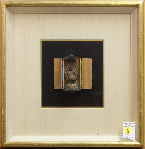 Japanese Portable Buddhist Shrine, Edo Period: Japanese zushi portable wooden shrine, Edo period, the small double-door cabinet opening to a bodhisattva seated on a lotus pedestal, his hands holding a cintamani (sacred jewel) and sword, the finely