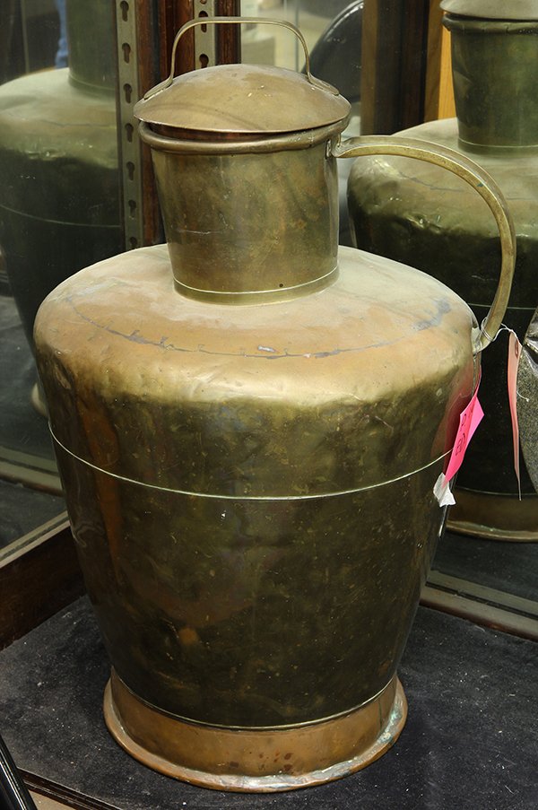 Monumental copper milk jug: Monumental copper milk jug, Holland 19th century, having a lid and an applied handle, 27"l x 15"dia. Provenance: Unaccessioned items from Honolulu Museum of Art, Lending Collection