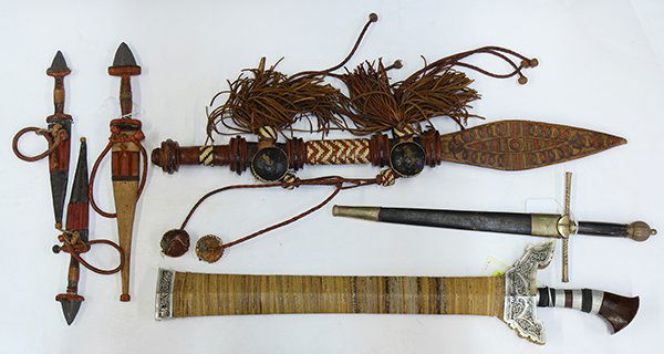(Lot of 6) African and Asian swords, consisting of a: (Lot of 6) African and Asian swords, consisting of a decorative Indonesian Kriss, 19th century Italian dagger, (3) Tuareg, and a Hausa. Provenance: Property from a private collection to benefit Honolu