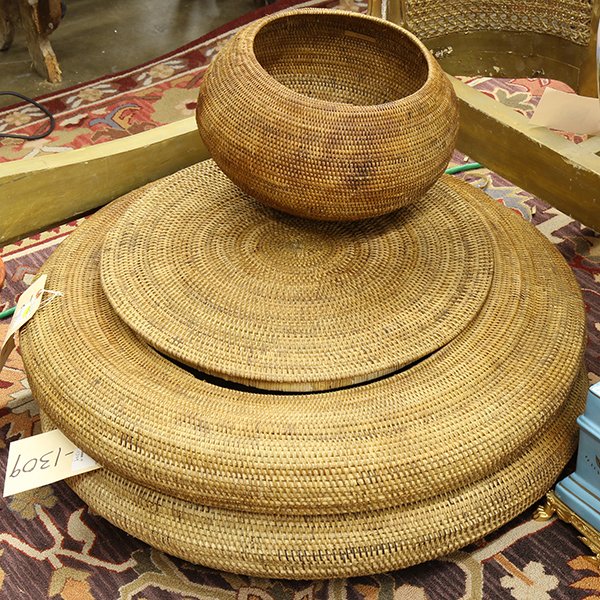 (lot of 3) Indonesian coiled storage baskets: (lot of 3) Indonesian coiled storage baskets, two with lids, possibly from central Lombok, of squat round form, largest: 8"h x 28"diam. Provenance: Property sold to benefit the Phoebe A. Hearst Museum