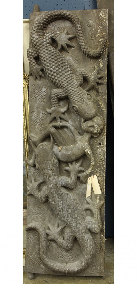 Southeast Asian carved door, the heavy decorative plank: Southeast Asian carved door, the heavy decorative plank having pronounced reptiles feasting, 76"h x 23"w. Provenance: From the estate of Edward Gerber
