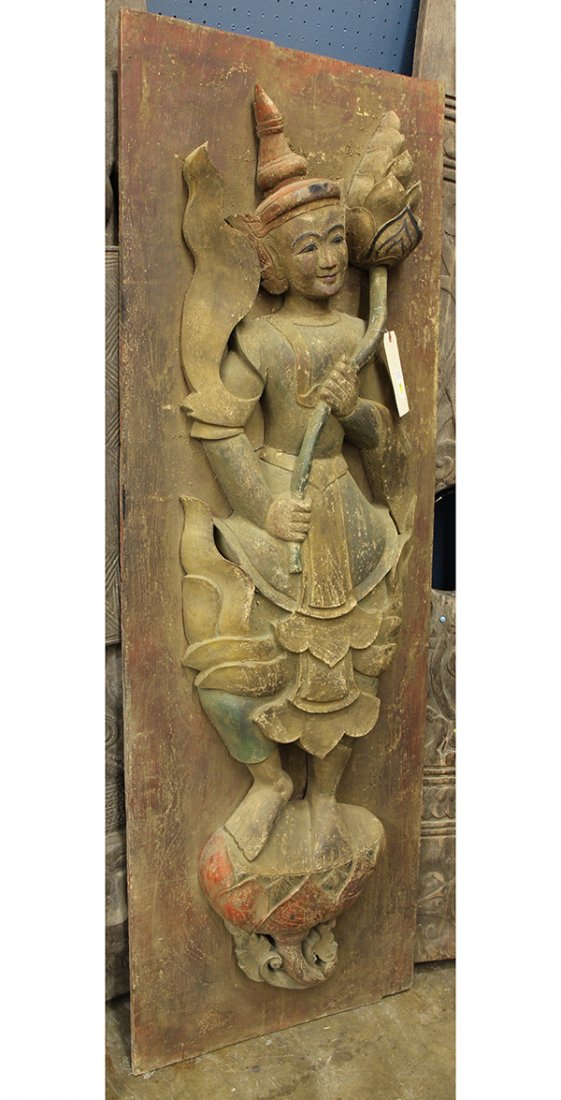 Thai polychrome carved door, the decorative plank: Thai polychrome carved door, the decorative plank featuring a pronounced narrative character, 66.75"h x 22.5"w. Provenance: From the estate of Edward Gerber