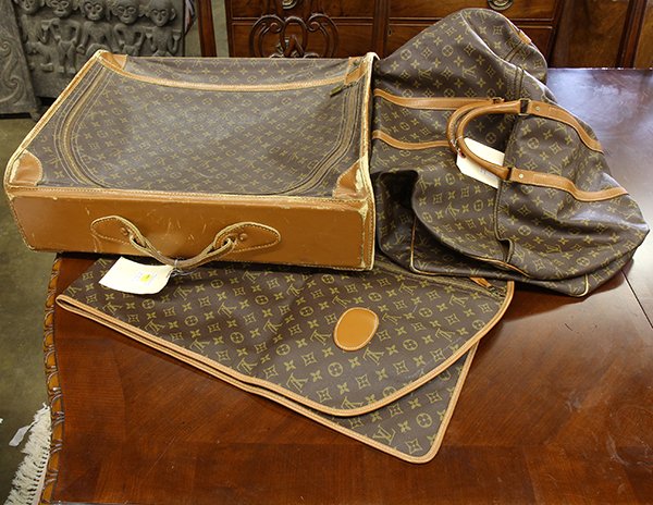 (lot of 3) Louis Vuitton and Louis Vuitton style soft: (lot of 3) Louis Vuitton and Louis Vuitton style soft shell luggage, including a garment bag, a small duffel bag, and a suitcase having a Louis Vuitton tag to interior, largest: 18"h x 22"w x 8"d