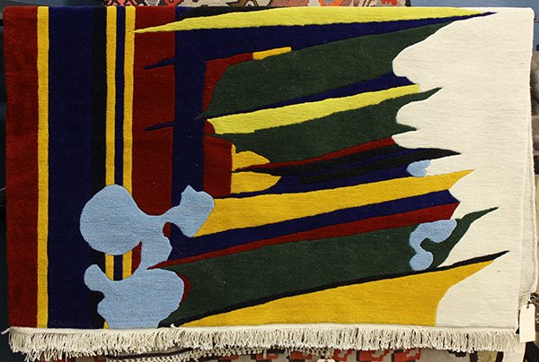 Nepalese carpet, with abstract cityscape design, 7'4" x: Nepalese carpet, with abstract cityscape design, 7'4" x 5'6". Provenance: From the estate of Edward Gerber
