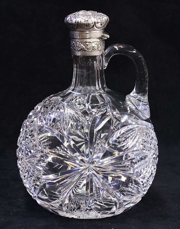 American Victorian sterling silver mounted whiskey jug: American Victorian sterling silver mounted whiskey jug, the brilliant cut glass vessel, possibly by J. Hoare & Company, Corning, New York, features a central flower with diamond reserves surrounding h