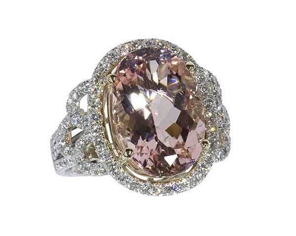 Morganite, diamond and 14k white gold ring: Morganite, diamond and 14k white gold ring centering one oval cut pink morganite measuring approximately 15.9 x 11.2 mm, weighing approximately 7.69 cts., accented by full cut diamonds weighing in tot