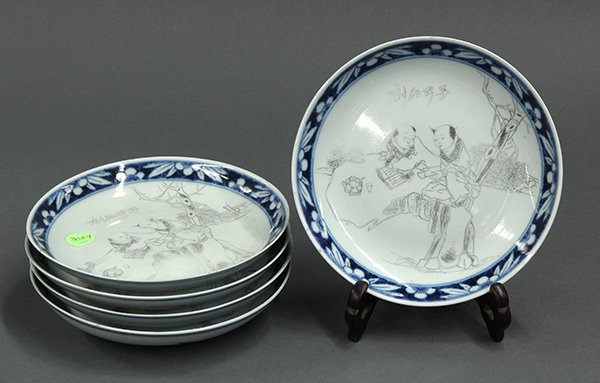 Five Chinese Etched Porcelain Plates: (lot of 5) Chinese underglaze blue and etched porcelain plates, late Qing/Republic period, the well with two children reading in a garden below the inscription 'Zizhen shi ke' (carved by Zizhen), the 