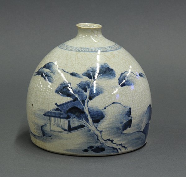 Japanese Old Imari Bottle: Japanese old Imari bottle, lipped rim and short neck above domed body, blue-and-white landscape on crackled white ground, marked [Chayama], 6"h x 6" dia