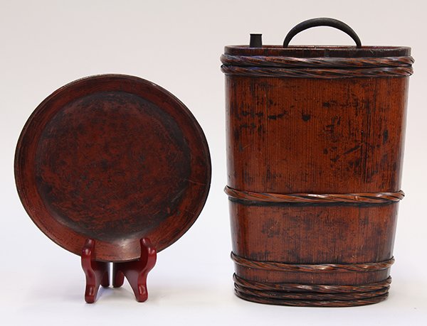 Japanese Lacquered Sake Cask and Bowl, Edo Period: (lot of 2) Japanese bamboo sake cask, late Edo period, negoro lacquered, topped with an iron handle and brass spout, together with lacquered shallow bowl, cask: approx. 10"h x 7.25"l x 5.25"w