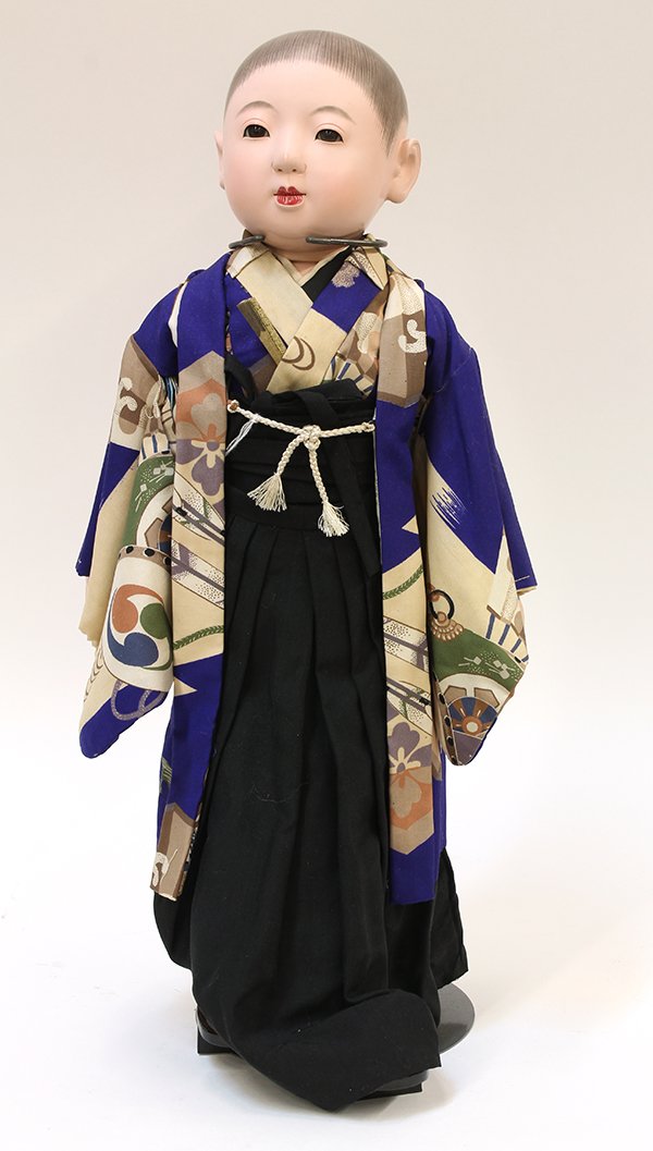 Japanese Yamato Doll, 1940s: Japanese Yamato doll, 'Taro', 1940's, of toso/gofun, in traditional boy's attire, with tabi and lacquered geta, with an original box, approx. 20"h