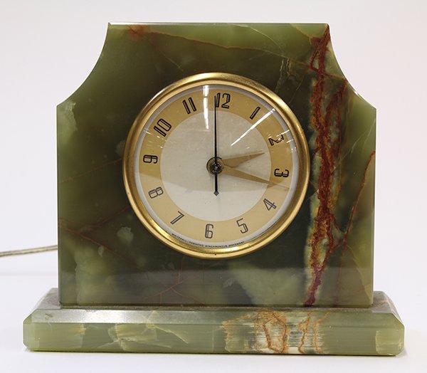 Art Deco mantle clock, having a variegated green onyx: Art Deco mantle clock, having a variegated green onyx surround and a silver and gold color dial with Arabic numerals, by Whitehall Hammond, 7"h x 8"w x 3"d