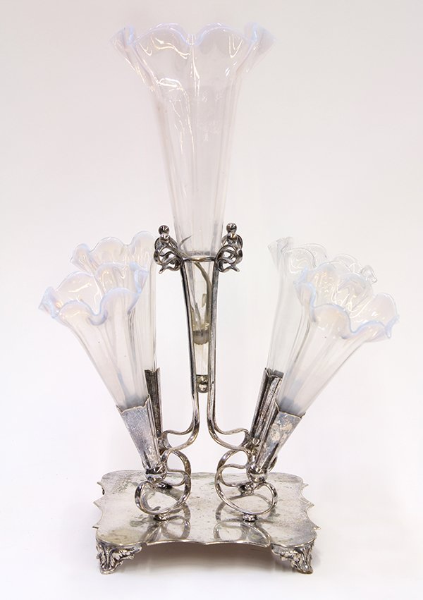 Victorian opalescent glass and silverplate epergne: Victorian opalescent glass and silverplate epergne, having four trumpet form opalescent glass vases surrounding a larger opalescent glass vase, all held in a silverplate stand rising on bracket feet, 