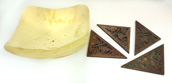 (lot of 5) Set of Tiffany Studios blotter corners in: (lot of 5) Set of Tiffany Studios blotter corners in the 'Grapevine' pattern, (glass missing) and marked 'Tiffany Studios New York'; together with a Dirk Van Erp Moderne hammered brass center bowl by
