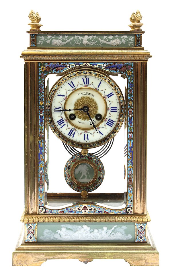 French champleve decorated mantle clock: French champleve decorated mantle clock, late 19th century, the brass case having flame finials, above an inset jasper reserve, surmounting the hinged door to front and reverse, accented with multi-co