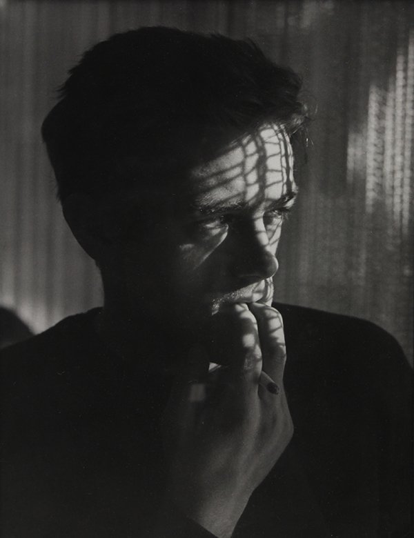 Roy Schatt, James Dean photograph: Roy Schatt (American, 1919-2002), James Dean, gelatin silver print, Roy Schatt Photographer stamp verso, sight: 13"h x 10"w, overall (framed): 21.5"h x 17.5"w. Note: The book, "James Dean A Portrait,"