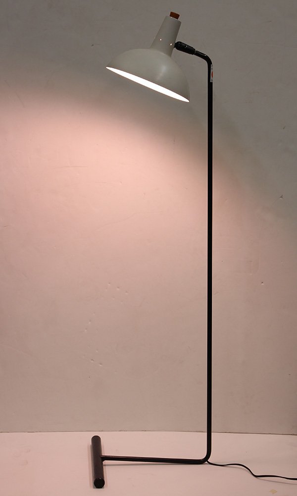 Mid-Century Modern floor lamp: Mid-Century Modern floor lamp, by Harry Gitlin for Middletown Mfg., having a white enameled shade with a Bakelite cap, above the black enameled aluminum tubular standard, 47.5"h