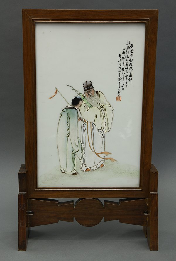 Chinese Porcelain Table Screen, Wang Longfu: Chinese enameled porcelain table screen, depicting two of the Eight Daoist immortals Zhang Guolao holding a fish drum and Han Xiangzi with a flute, the upper right with a colophon, bearing signature '