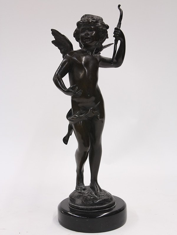 Patinated bronze figural sculpture: Patinated bronze figural sculpture, after Auguste Moreau, depicting a winged Cupid bearing a bow, and rising on a circular marble plinth, signed Moreau sculpteur on base, 15.5"h