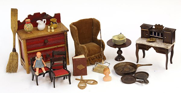Five shelves of antique and vintage doll house: Five shelves of antique and vintage doll house furniture, dolls, and accessories, 1890-1940, a collection spanning three generations, including a bent wood dining table and chairs, (2) metal prams, a