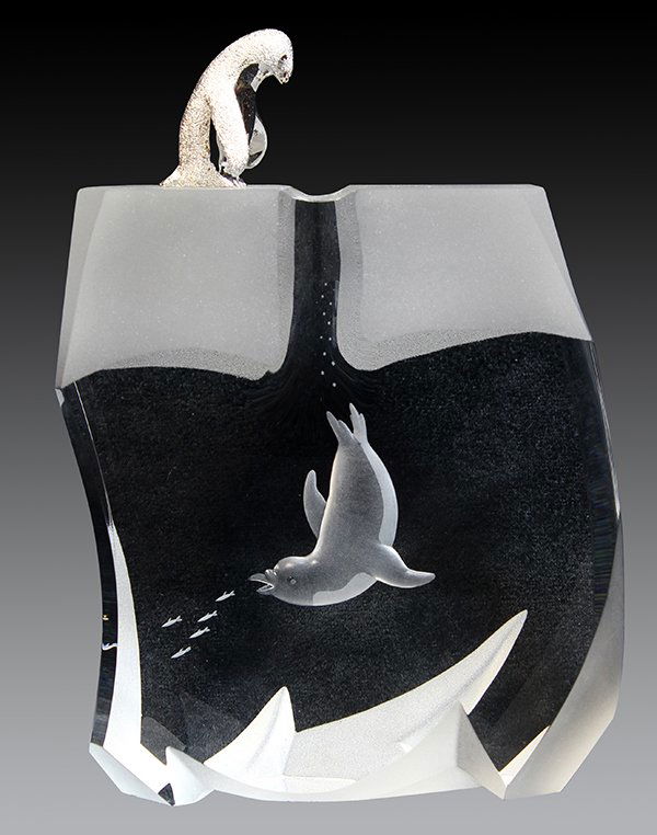 Steuben "Ice Penguin" crystal sculpture designed by: Steuben "Ice Penguin" crystal sculpture designed by James Houston (1921-2005), in etched and intaglio cut crystal, the top accented with a figure of a diving penguin, in original presentation box, sig