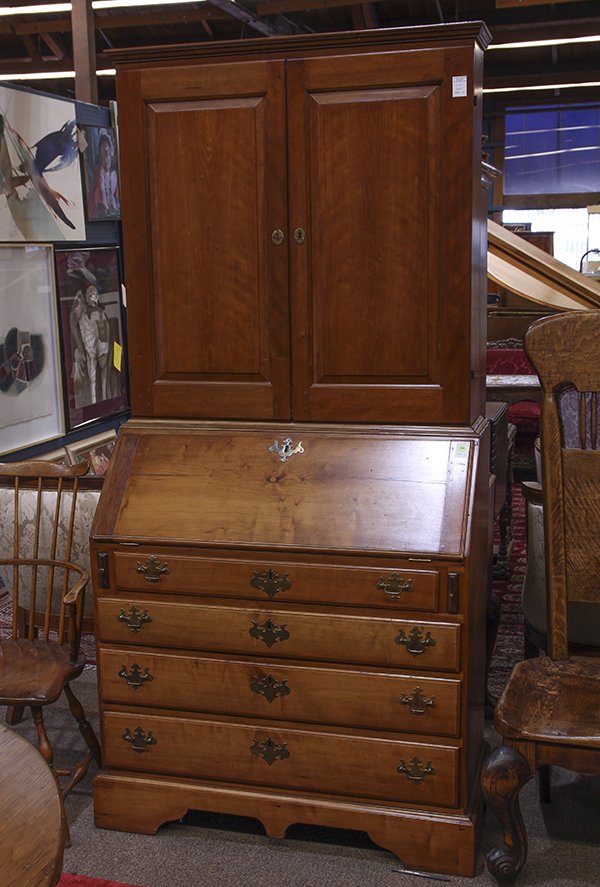 Chippendale slant front desk, 1750-1780, the desk,: Chippendale slant front desk, 1750-1780, the desk, having a fall front opening to a later fitted interior, surmounting four graduated drawers with brass bat-wing pulls, above a shaped apron, the whole