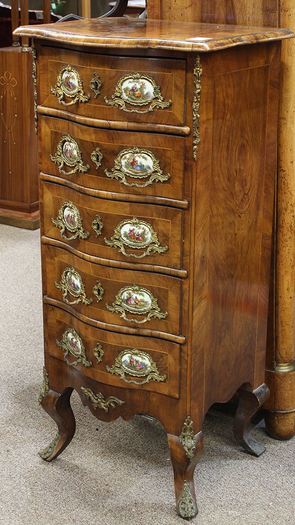 Louis XV style chest: Louis XV style chest, the serpentine top having inlaid banding, above five drawers case, having oromulu mounts and escutcheons with Sevres style porcelain inset pulls depicting genre scenes, and risin