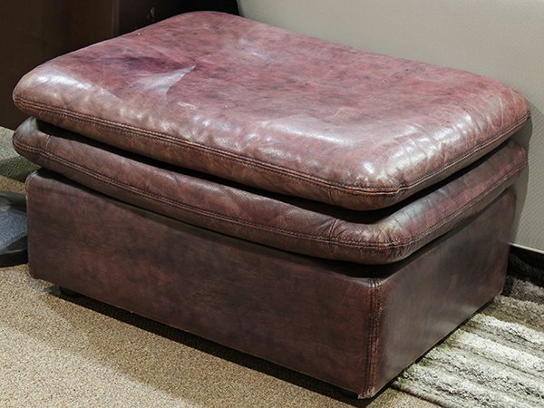 Pair of Moderne footstools: Pair of Moderne footstools, having a rectangular form, upholstered in Cordovan leather, 17"h x 30"w x 23"d