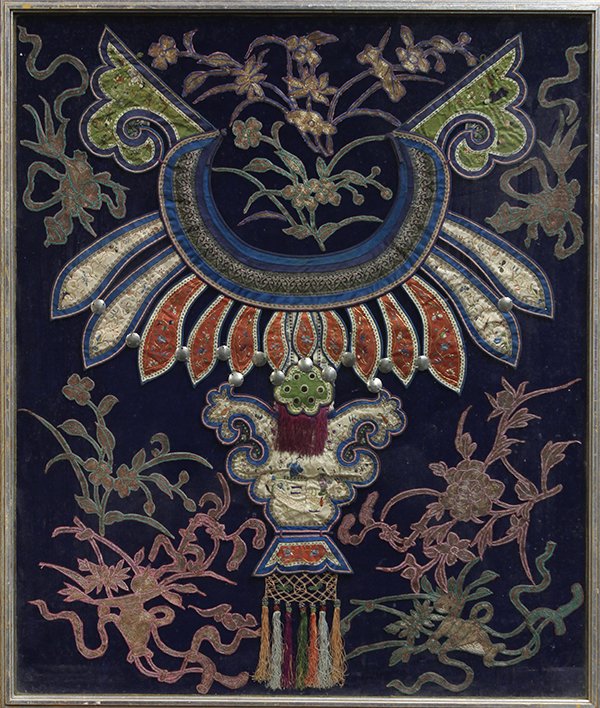 Framed Chinese Embroidered Collar: Chinese embroidered collar, with a green ruyi head embroidered with figures, the back with white and orange lappets suspending a flower basket, framed with gilt couched floral appliques, overall (fram