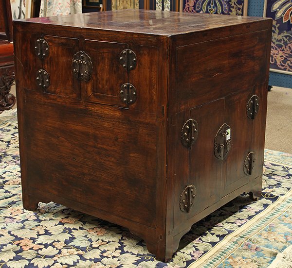 Chinese Square Form Storage Chest: Chinese wooden storage chest, of square section fronted by a pair of medium sized double doors to the lower section, the two sides each with a pair of small double doors to the upper portion, with met