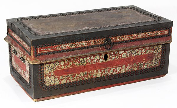 American leather and paint decorated document box: American leather and paint decorated document box, having floral and geometric sprays accented with brass nail head trim, 8.5"h x 19.5"w x 9.75"d