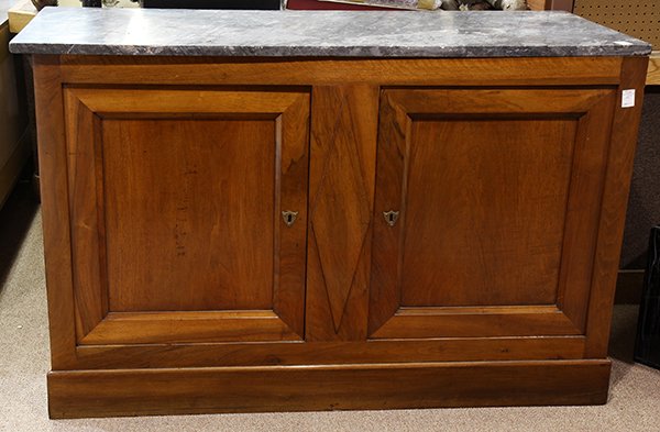 French Directoire buffet: French Directoire buffet, executed in walnut, having a rectangular marble top, above the two door case, and rising on a molded base, 41"h x 63"w x 25"d (key in office)
