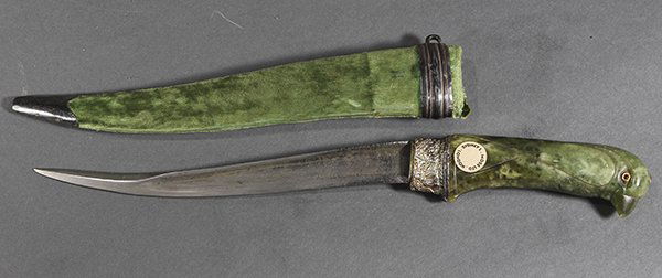 Mughal Style Dagger with Jade Hilt: East Indian Mughal type jade hilted khanjar dagger, the mottled green jade hilt carved in the form of a parrot with red glass eyes, mounted with a curved double edged steel blade, the scabbard wrapped