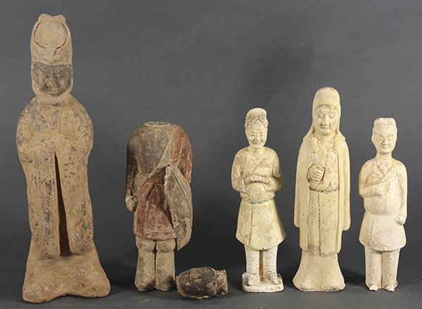 Chinese Group of Pottery Tomb Figures: (lot of 5) Group Chinese pottery figures; three straw glazed male figures, Sui/Tang dynasty, including one cloaked in a hood and long over-garments; together with a Six Dynasties warrior holding a shi