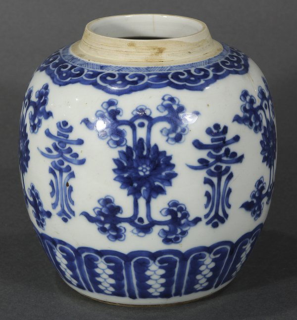 Chinese Blue and White Porcelain Jar: Chinese underglaze blue porcelain jar, decorated with stylized lotus scrolls and a shou pattern to the body, ruyi heads to the shoulder, the base with double ring mark, 7"h