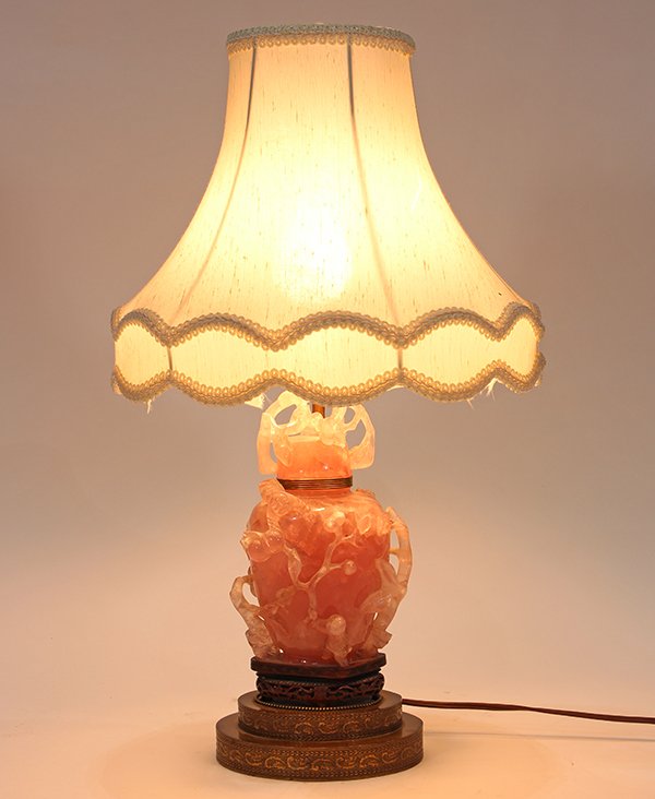 Chinese Rose Quartz Urn: Chinese rose quartz covered urn, mounted as a lamp, carved with two children playing amid peach sprigs, reversed with a bird, overall: 20.75"h, covered urn: 9"h