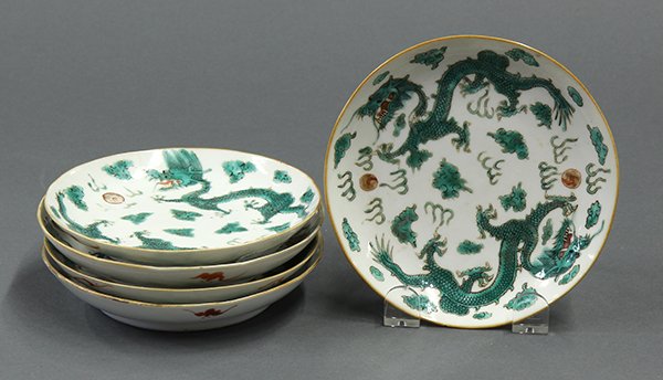 Five Chinese Porcelain Dishes, Dragons: (lot of 5) Chinese enameled porcelain dishes, each featuring a pair of writhing green dragons in pursuit of flaming jewels, the bases with red Daoguang marks, each: 5.6"w