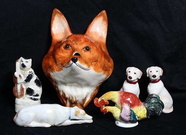 (lot of 6) English Staffordshire: (lot of 6) English Staffordshire, consisting of a cat with violin, greyhound, a pair of dog salt and pepper shakers; together with a fox string dispenser, and a rooster, largest: 7"h. Provenance: From
