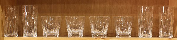 (lot of 8) One shelf of Saint Louis crystal barware in: (lot of 8) One shelf of Saint Louis crystal barware in the Criss-cross pattern, consisting of (4) double old fashioned glasses, and (4) tumblers, tallest 6"h. Provenance: From the Nantucket, MA estate