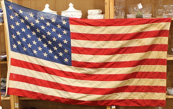 Fifty star American parade flag: Fifty star American parade flag, on a pole, 72"h
