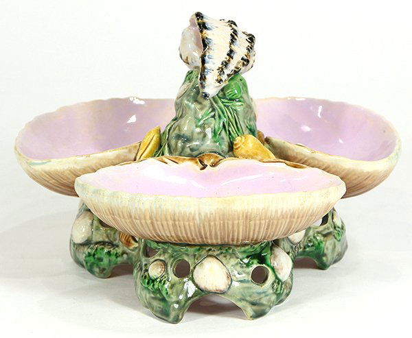 Minton majolica shell form sweetmeat dish, 19th: Minton majolica shell form sweetmeat dish, 19th century, naturalistically modeled with half shells, above a shell-encrusted base, underside with Charles L. Washburne Antiques label, 5"h. Provenance: F