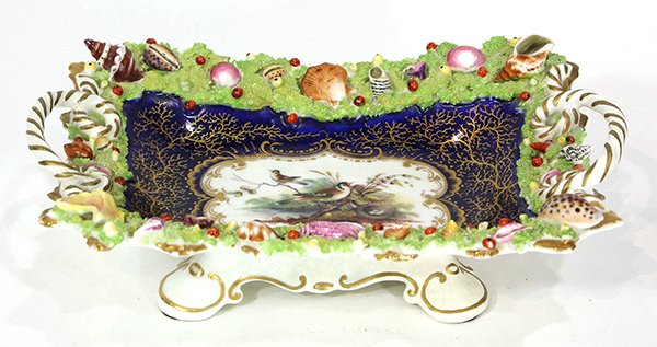 English porcelain basket possibly Spode circa 1890, of: English porcelain basket possibly Spode circa 1890, of rectangular form centering a hand painted cartouche of birds in a landscape, surrounded by painted gilt coral on a cobalt ground, the figural rim