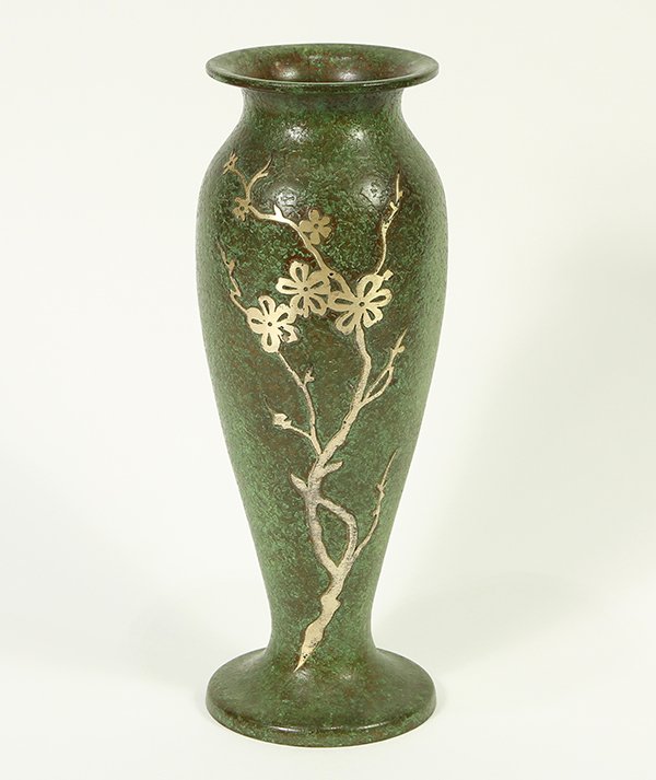 Arts and Crafts Silvercrest silver overlay on bronze: Arts and Crafts Silvercrest silver overlay on bronze vase, having a tapered form decorated with silver floral branches, on a verdis finished ground, stamped on underside, 9.75"h