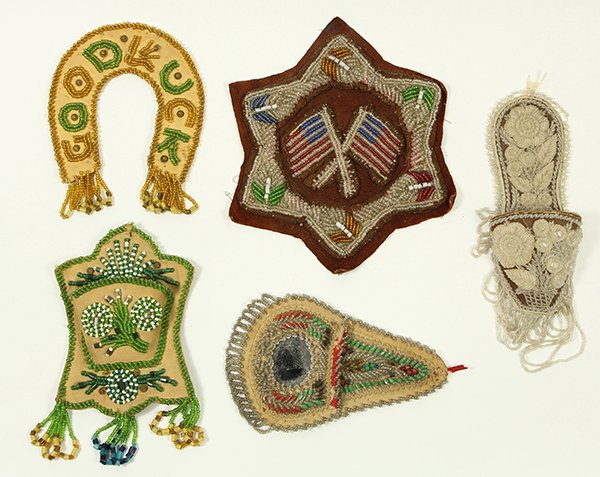 (lot of 5) Iriquois or Mohawk beaded whimsey group: (lot of 5) Iriquois or Mohawk beaded whimsey group, circa 1910, executed in glass beads, leather, and silk, consisting of a leather six point star with beaded American flags,8.5"dia; a silk wall pocke