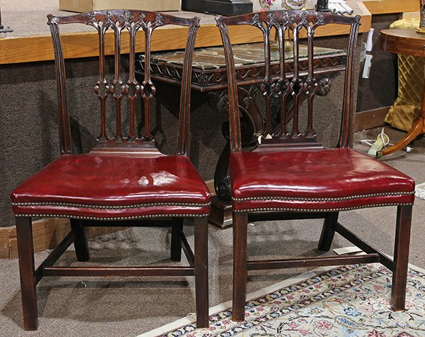 Pair of George III mahogany side chairs: Pair of George III mahogany side chairs, late 18th century, having a shaped crest above the Gothic pierced splat, surmounting the red upholstered seat and rising on square legs, 37.5"h x 23.5"w x 20"d
