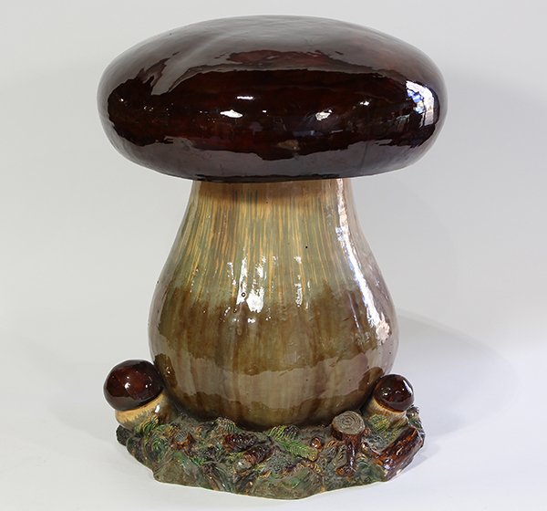 William Schiller & Sons (Austrian) majolica mushroom: William Schiller & Sons (Austrian) majolica mushroom stool, 19th century, having a stylized form, with a dark brown cap, above the mottled taupe stalk, and rising on a naturalistic base, with impresse