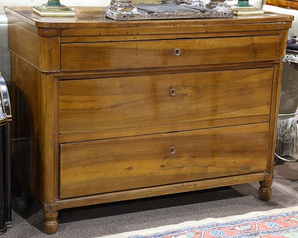 French Directoire fruitwood buffet: French Directoire fruitwood buffet, mid 19th century, having a flatware drawer, above the three drawer case, and rising on turned legs 52"h x 43"w x 24"d. Provenance: From the Pittsburgh, PA estate of
