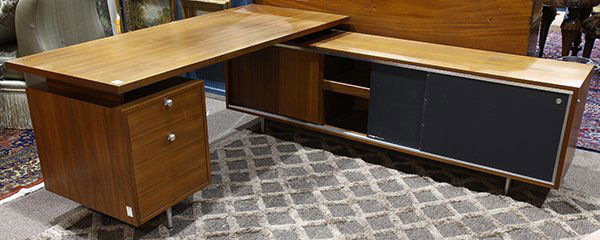 George Nelson for Herman Miller walnut and chrome: George Nelson for Herman Miller walnut and chrome Executive desk and return, circa 1960, the rectangular desk top above a drawer pedestal, the return having two sliding doors, concealing pull out draw