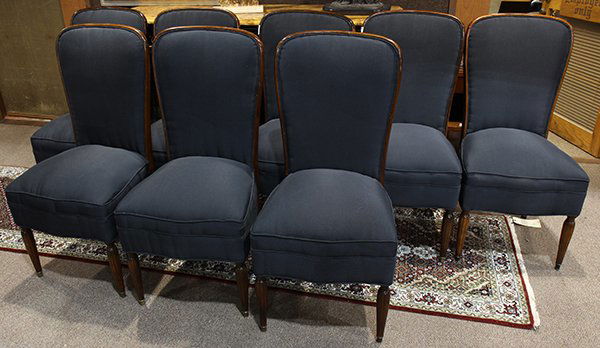 (lot of 8) French Art Deco rosewood dining chairs circa: (lot of 8) French Art Deco rosewood dining chairs circa 1930, each having a tapered rectangular back upholstered in navy blue, and rising on tapered legs, 40"h x 19"w x 16.5"d